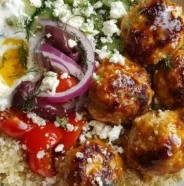 Mediterranean hot honey chicken meatball bowls with tzatziki and quinoa