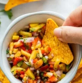 Fresh Peach Salsa made with ripe peaches, herbs, and spices