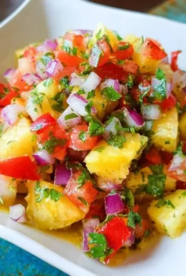 Delicious and colorful pineapple salsa served in a bowl