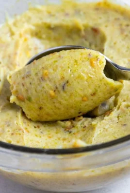 Delicious pistachio ganache in a decorative bowl, ideal for desserts