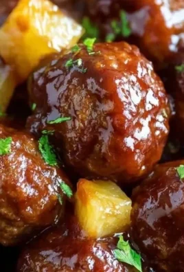 Slow Cooker Pineapple Barbecue Meatballs served in a bowl with sauce