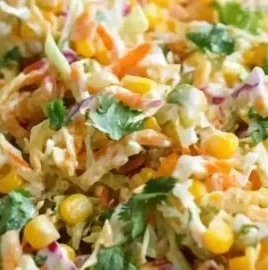 Deliciously vibrant spicy corn slaw served in a bowl during summer.