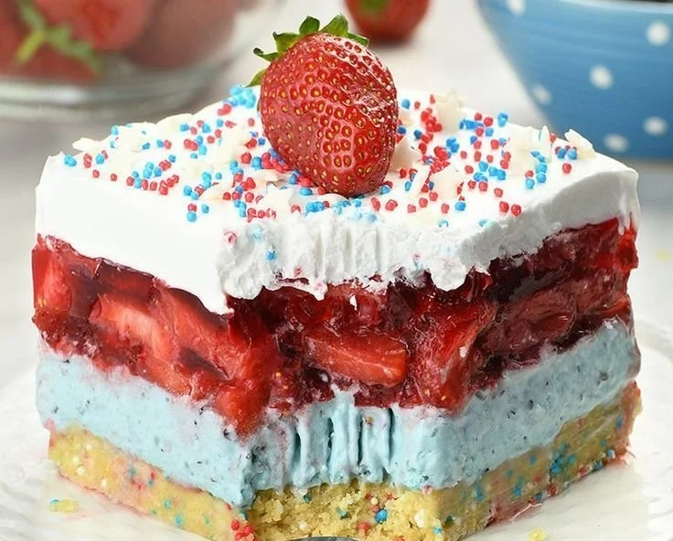 Delicious Summer Berry Jello Lasagna with layers of colorful fruits and gelatine