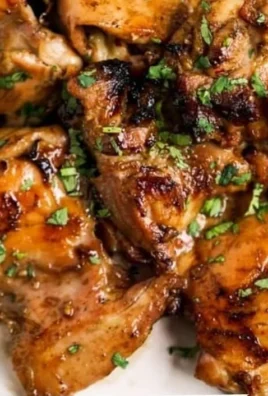 Deliciously marinated Thai grilled chicken served with fresh herbs and lime
