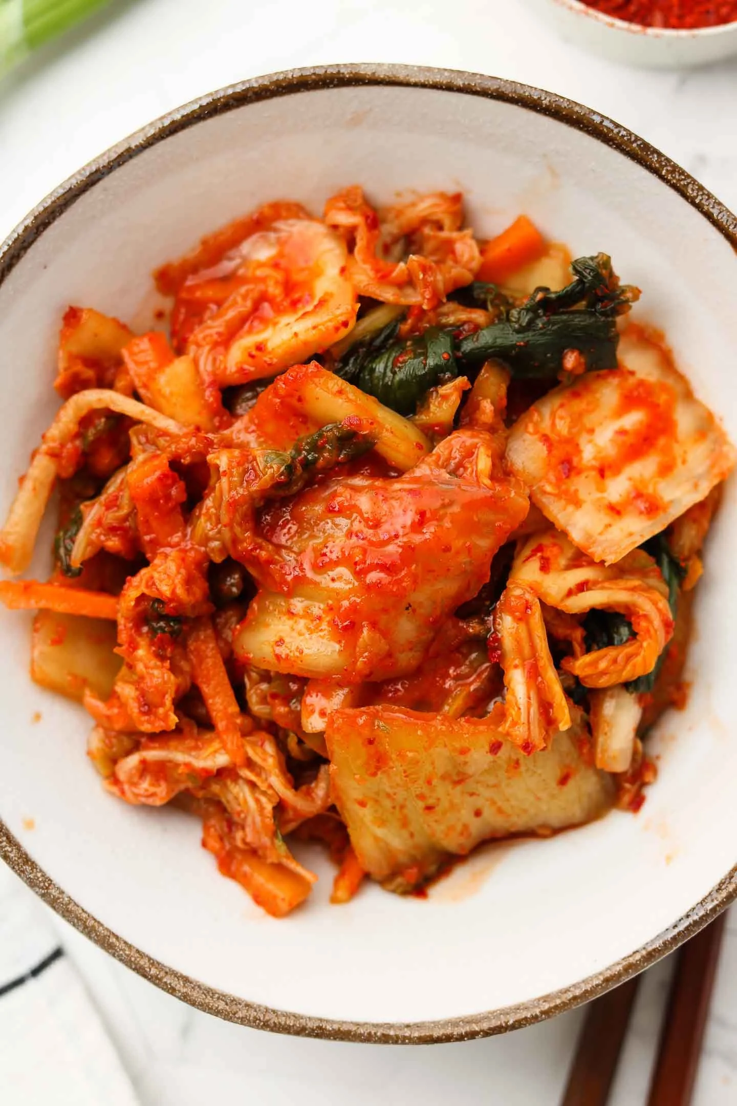 Bowl of homemade Vegan Kimchi with spices and vegetables
