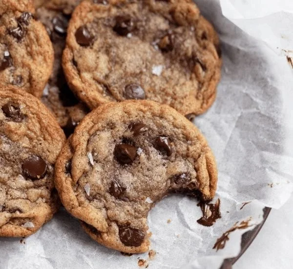 Delicious banana chocolate chip cookies on a plate, showcasing their gooey texture