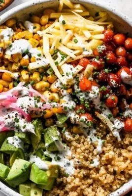 BBQ ranch chickpea quinoa bowls with fresh vegetables and dressing