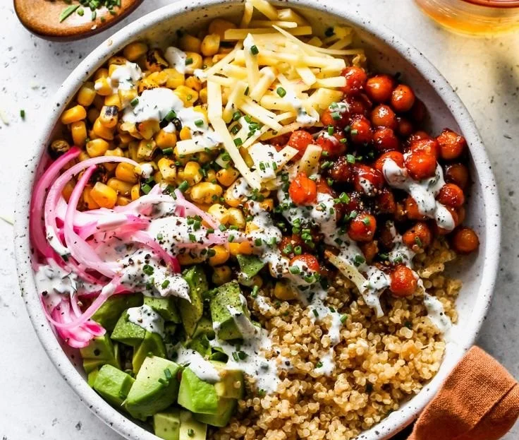 BBQ ranch chickpea quinoa bowls with fresh vegetables and dressing