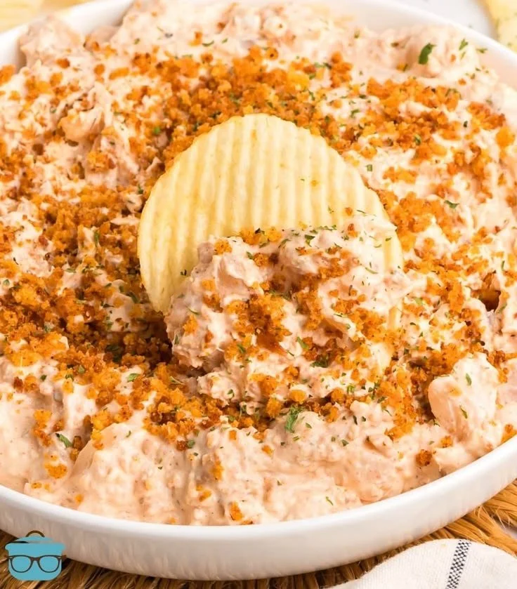 Delicious Bloomin’ Onion Dip served in a bowl with crunchy chips.