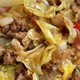 Delicious cabbage roll skillet with ground beef in a savory sauce.