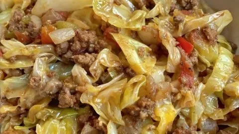 Delicious cabbage roll skillet with ground beef in a savory sauce.