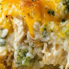 Cheesy broccoli chicken casserole with rice on a plate