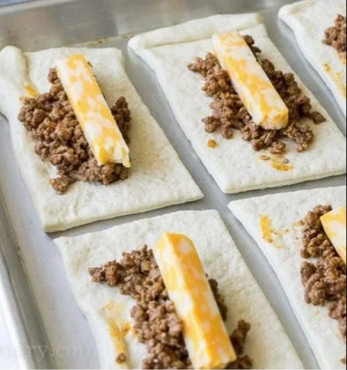 Delicious cheesy taco sticks ready to be served with dipping sauce.