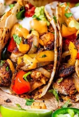 Colorful Chicken Fajitas served on a platter with fresh vegetables and toppings