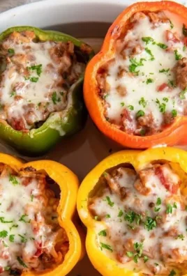 Classic stuffed peppers baked with savory filling of rice and ground meat