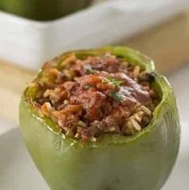 Classic stuffed peppers filled with rice and ground meat, ready to serve.