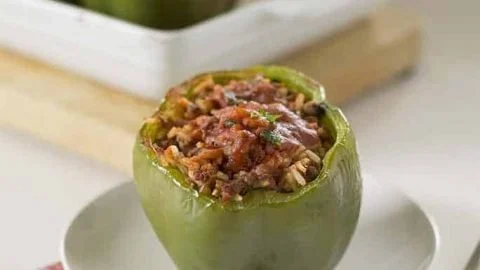 Classic stuffed peppers filled with rice and ground meat, ready to serve.
