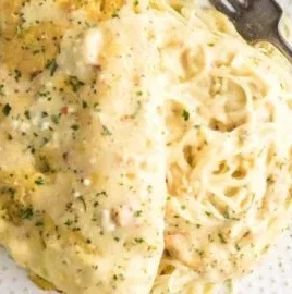 Crock Pot Angel Chicken recipe with creamy sauce and tender chicken.