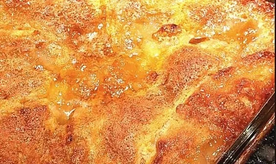 Delicious easy peach cobbler with fresh peaches and a golden crust