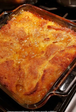 Delicious homemade peach cobbler dessert with golden crust