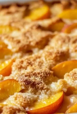Easy peach cobbler made with canned peaches, served warm in a dish.