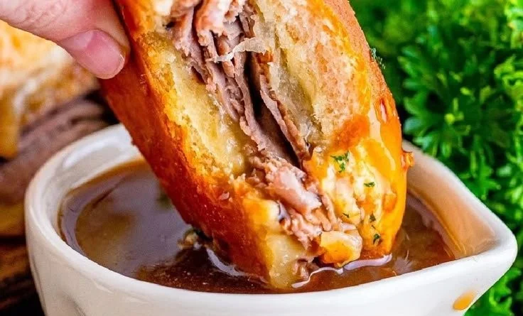 Delicious French Dip Sliders with au jus for dipping