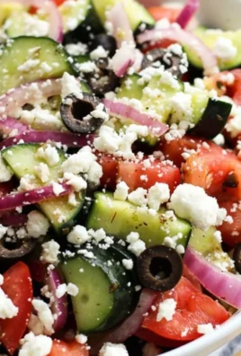 Fresh Greek Cucumber Salad with tomatoes, olives, and feta cheese