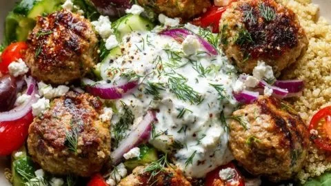Greek turkey meatball bowls with Mediterranean flavors and vibrant ingredients.