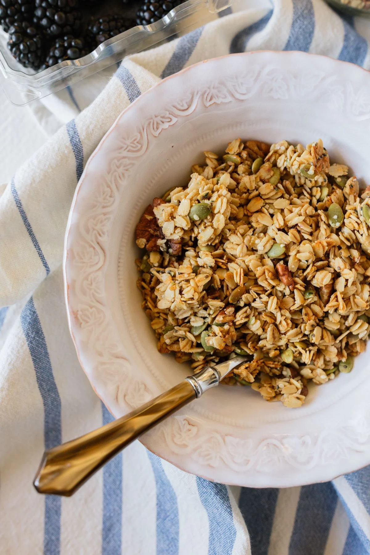 Homemade healthy granola in a bowl with nuts and fruits
