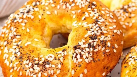 High protein bagels topped with cottage cheese and herbs for a healthy meal option.