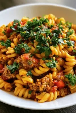 High Protein Taco Pasta with 36g protein per serving in a colorful bowl