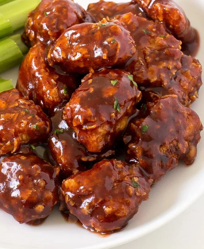 Delicious honey barbecue chicken bites on a platter ready to enjoy