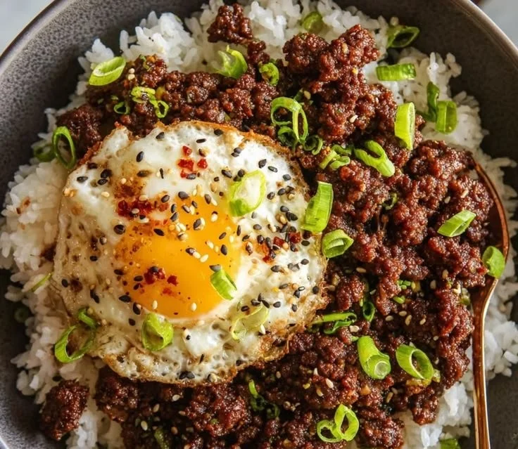 Korean Ground Beef Bowl garnished with green onions and sesame seeds