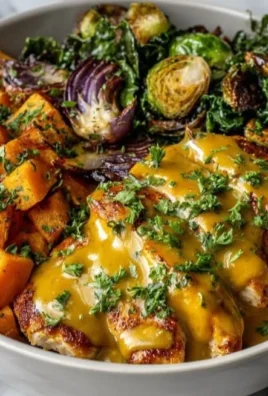 Maple Dijon Chicken Sweet Potato Bowls with vibrant vegetables and sauces
