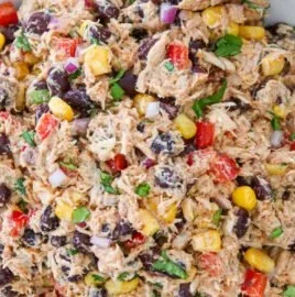 Delicious Mexican tuna salad with corn, served in a colorful bowl.