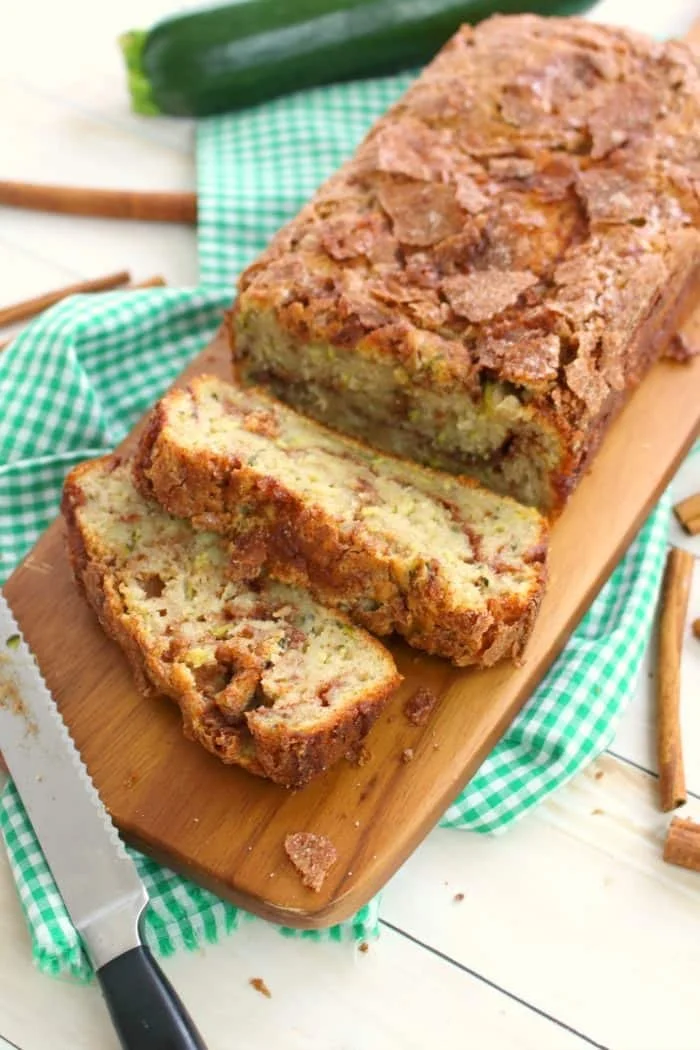 Moist cinnamon swirl zucchini bread sliced and ready to enjoy