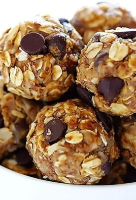 Plate of no-bake energy bites made with oats, nuts, and honey