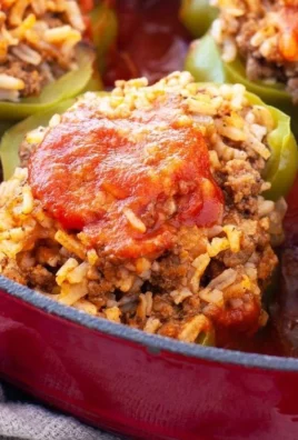 Old Fashioned Stuffed Bell Peppers filled with rice, meat, and spices