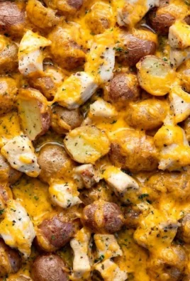 One Pan Ranch Chicken with crispy potatoes in a skillet.