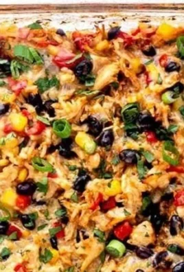 Delicious Protein Burrito Casserole topped with cheese and spices