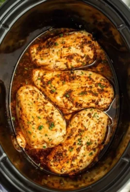 Slow Cooker chicken breasts served with vegetables in a bowl