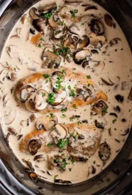 Delicious slow cooker mushroom chicken served with herbs and spices