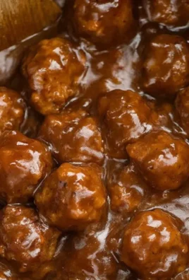 Slow Cooker Salisbury Steak Meatballs served with creamy gravy and mashed potatoes