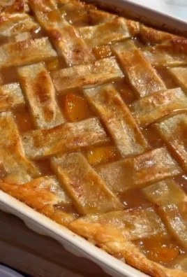 Delicious homemade Southern peach cobbler served in a dish