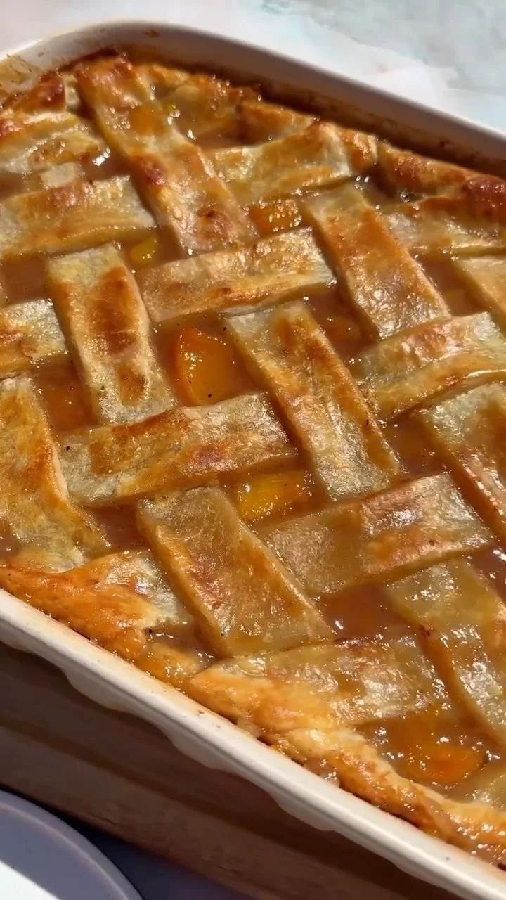 Delicious homemade Southern peach cobbler served in a dish