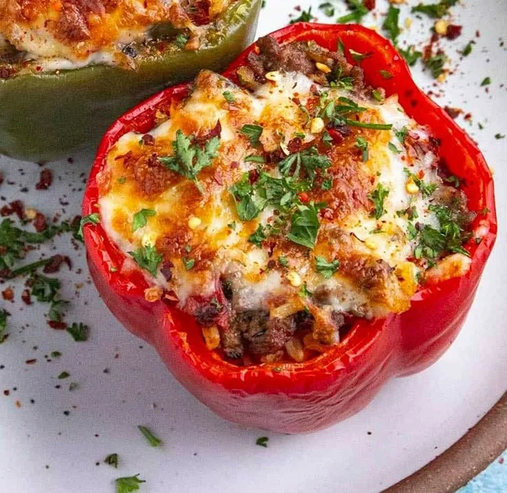 Colorful stuffed bell peppers filled with rice and vegetables