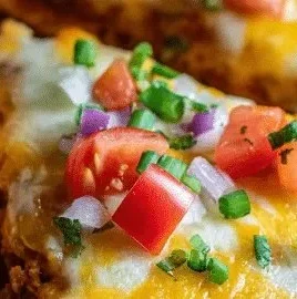 Taco Bell Mexican Pizza topped with savory ingredients and cheese.