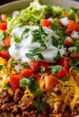 Delicious Taco Rice Bowl with fresh toppings and savory ingredients