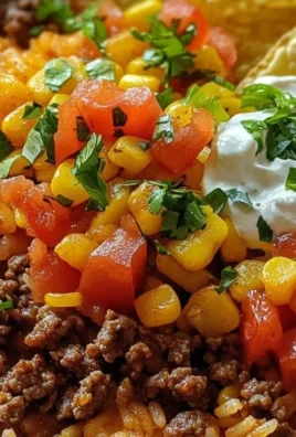 Delicious Taco Rice Bowl topped with Doritos for extra crunch