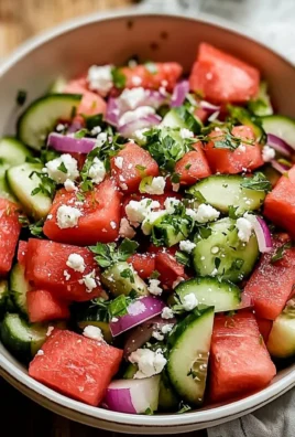 Bowl of refreshing watermelon salad with mint and feta cheese